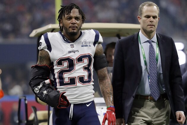 New England Patriots' Patrick Chung (23) leaves the game after he injured his right arm during the second half of the NFL Super Bowl 53 football game against the Los Angeles Rams Sunday, Feb. 3, 2019, in Atlanta. (AP Photo/Jeff Roberson)