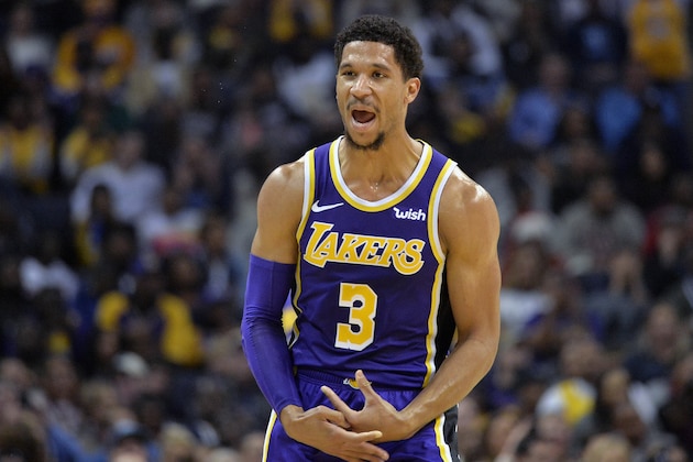 Los Angeles Lakers guard Josh Hart (3) reacts after scoring a 3-point shot in the first half of an NBA basketball game against the Memphis Grizzlies on Saturday, Dec. 8, 2018, in Memphis, Tenn. (AP Photo/Brandon Dill)