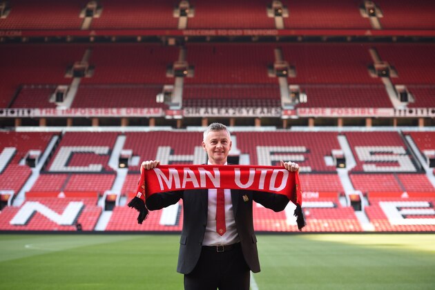 Manchester United's Norwegian manager Ole Gunnar Solskjaer poses during a photo call at Old Trafford in Manchester, northwest England, on March 28, 2019 after it was announced that he was appointed as the clubs full-time manager on a three-year contract. - Ole Gunnar Solskjaer said he was 'beyond excited' to be handed the Manchester United manager's job on a full-time basis as the club announced on Thursday he had signed a three-year deal. (Photo by Oli SCARFF / AFP) / RESTRICTED TO EDITORIAL USE. No use with unauthorized audio, video, data, fixture lists, club/league logos or 'live' services. Online in-match use limited to 75 images, no video emulation. No use in betting, games or single club/league/player publications. /         (Photo credit should read OLI SCARFF/AFP/Getty Images)