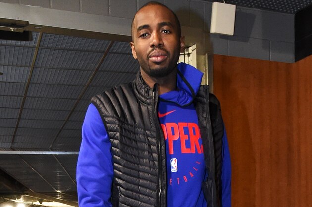 LOS ANGELES, CA - DECEMBER 29:  Luc Mbah a Moute #12 of the LA Clippers arrives at the arena before the game against the San Antonio Spurs on December 29, 2018 at STAPLES Center in Los Angeles, California. NOTE TO USER: User expressly acknowledges and agrees that, by downloading and/or using this Photograph, user is consenting to the terms and conditions of the Getty Images License Agreement. Mandatory Copyright Notice: Copyright 2018 NBAE (Photo by Andrew D. Bernstein/NBAE via Getty Images)