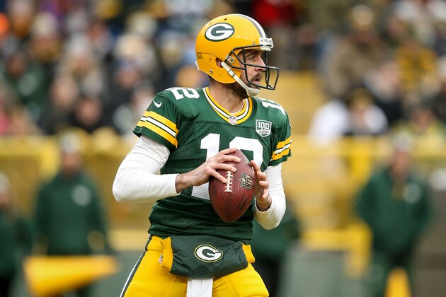 GREEN BAY, WISCONSIN - DECEMBER 30:  Aaron Rodgers #12 of the Green Bay Packers drops back to pass in the first quarter against the Detroit Lions at Lambeau Field on December 30, 2018 in Green Bay, Wisconsin. (Photo by Dylan Buell/Getty Images)