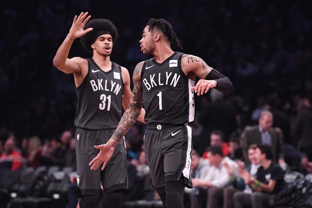 NEW YORK, NY - FEBRUARY 6: D'Angelo Russell #1 and Jarrett Allen #31 of the Brooklyn Nets celebrate during the game against the Denver Nuggets at Barclays Center on February 6, 2019 in the Brooklyn borough of New York City. NOTE TO USER: User expressly acknowledges and agrees that, by downloading and or using this photograph, User is consenting to the terms and conditions of the Getty Images License Agreement. (Photo by Matteo Marchi/Getty Images)
