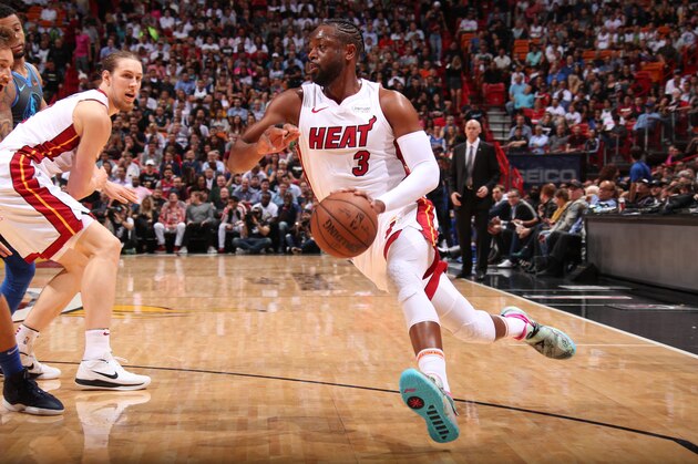 MIAMI, FL - MARCH 28: Dwyane Wade #3 of the Miami Heat drives to the basket against the Dallas Mavericks on March 28, 2019 at American Airlines Arena in Miami, Florida. NOTE TO USER: User expressly acknowledges and agrees that, by downloading and or using this Photograph, user is consenting to the terms and conditions of the Getty Images License Agreement. Mandatory Copyright Notice: Copyright 2019 NBAE (Photo by Issac Baldizon/NBAE via Getty Images)