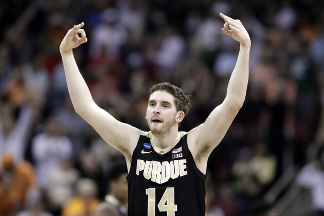Purdue's Ryan Cline celebrates after hitting a shot against Tennessee during the second half of a men's NCAA Tournament college basketball South Regional semifinal game Thursday, March 28, 2019, in Louisville, Ky. (AP Photo/Michael Conroy)