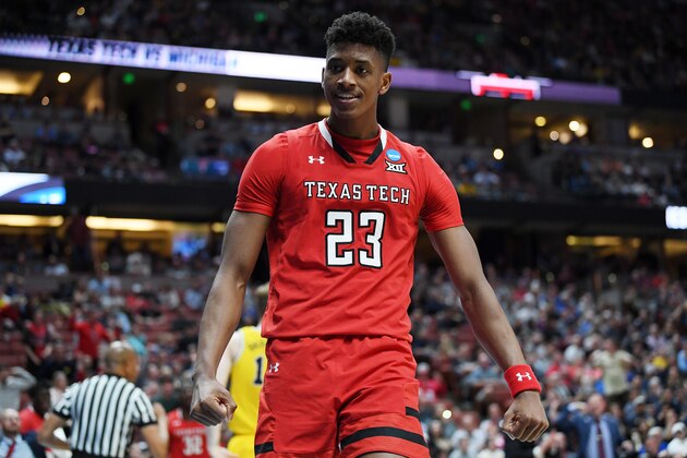 ANAHEIM, CALIFORNIA - MARCH 28: Jarrett Culver #23 of the Texas Tech Red Raiders celebrates after making a basket and drawing a foul against the Michigan Wolverines during the 2019 NCAA Men's Basketball Tournament West Regional at Honda Center on March 28, 2019 in Anaheim, California. (Photo by Harry How/Getty Images)
