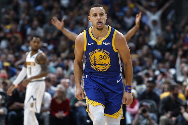 Golden State Warriors guard Stephen Curry reacts after hitting a 3-point basket against the Denver Nuggets in the second half of an NBA basketball game, Tuesday, Jan. 15, 2019, in Denver. The Warriors won 142-111. (AP Photo/David Zalubowski)