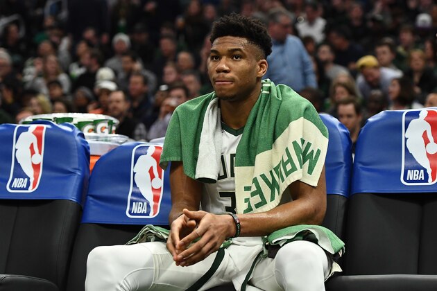 MILWAUKEE, WISCONSIN - MARCH 26:  Giannis Antetokounmpo #34 of the Milwaukee Bucks sits on the bench during a game against the Houston Rockets at Fiserv Forum on March 26, 2019 in Milwaukee, Wisconsin. NOTE TO USER: User expressly acknowledges and agrees that, by downloading and or using this photograph, User is consenting to the terms and conditions of the Getty Images License Agreement. (Photo by Stacy Revere/Getty Images)