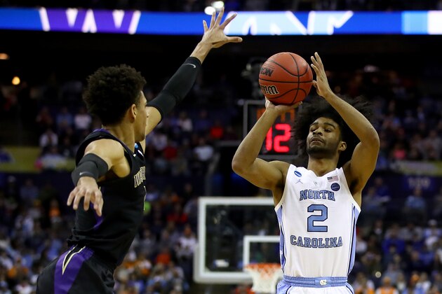 COLUMBUS, OHIO - MARCH 24:  Coby White #2 of the North Carolina Tar Heels takes a shot against David Crisp #1 of the Washington Huskies during their game in the Second Round of the NCAA Basketball Tournament at Nationwide Arena on March 24, 2019 in Columbus, Ohio. (Photo by Gregory Shamus/Getty Images)