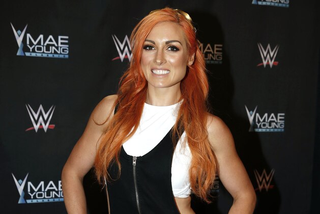 IMAGE DISTRIBUTED FOR WWE - WWE Superstar Becky Lynch celebrates the Mae Young Classic at the Thomas & Mack Center on Tuesday, Sept. 12, 2017, in Las Vegas. (Bizuayehu Tesfaye/AP Images for WWE)