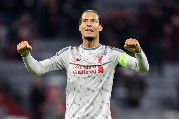 MUNICH, GERMANY - MARCH 13: Virgil Van Dijk of FC Liverpool celebrates after winning the UEFA Champions League Round of 16 Second Leg match between FC Bayern Muenchen and Liverpool at Allianz Arena on March 13, 2019 in Munich, Bavaria. (Photo by Boris Streubel/Getty Images)