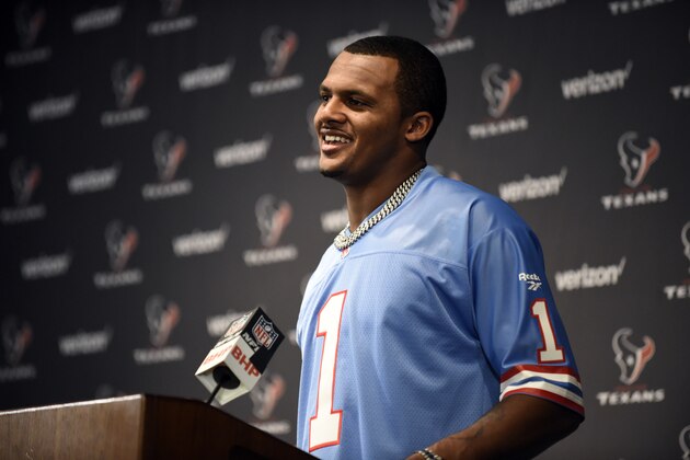 Houston Texans quarterback Deshaun Watson, wearing a Warren Moon Houston Oilers jersey, responds to a question during a news conference after after an NFL football game against the Cleveland Browns on Sunday, Oct. 15, 2017, in Houston. (AP Photo/Eric Christian Smith)