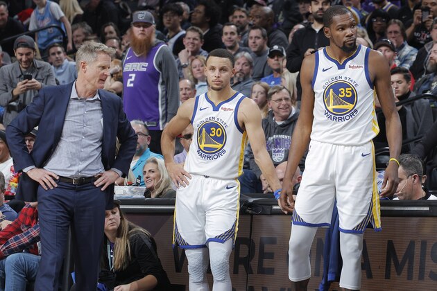 SACRAMENTO, CA - DECEMBER 14: Head Coach Steve Kerr of the Golden State Warriors coaches Stephen Curry #30 and Kevin Durant #35 against the Sacramento Kings on December 14, 2018 at Golden 1 Center in Sacramento, California. NOTE TO USER: User expressly acknowledges and agrees that, by downloading and or using this photograph, User is consenting to the terms and conditions of the Getty Images Agreement. Mandatory Copyright Notice: Copyright 2018 NBAE (Photo by Rocky Widner/NBAE via Getty Images)