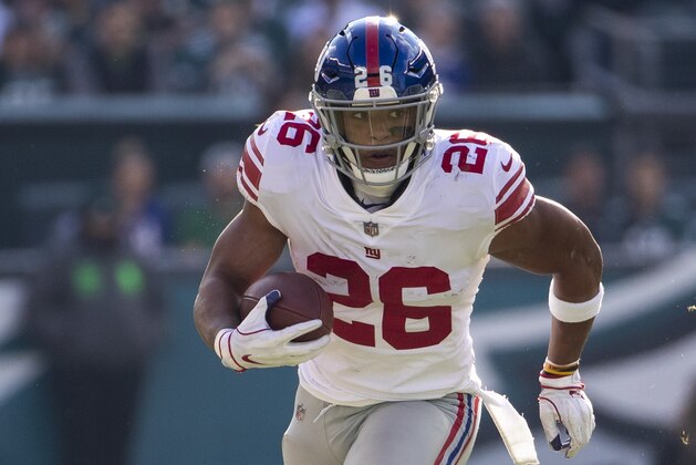 New York Giants running back Saquon Barkley in action during the first half of the NFL football game against the Philadelphia Eagles, Sunday, Nov. 25, 2018, in Philadelphia. The Eagles won 25-22. (AP Photo/Chris Szagola)
