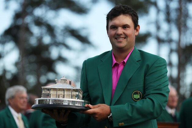 AUGUSTA, GA - APRIL 08:  Patrick Reed of the United States celebrates with the trophy during the green jacket ceremony after winning the 2018 Masters Tournament at Augusta National Golf Club on April 8, 2018 in Augusta, Georgia.  (Photo by Patrick Smith/Getty Images)