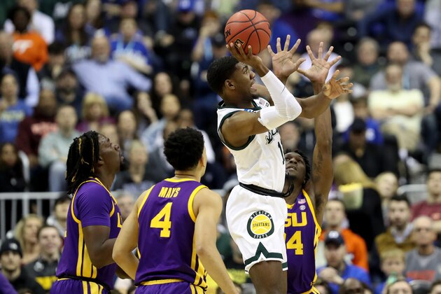 WASHINGTON, DC - MARCH 29: Aaron Henry #11 of the Michigan State Spartans shoots the ball against Emmitt Williams #24, Naz Reid #0 and Skylar Mays #4 of the LSU Tigers during the first half in the East Regional game of the 2019 NCAA Men's Basketball Tournament at Capital One Arena on March 29, 2019 in Washington, DC. (Photo by Rob Carr/Getty Images)
