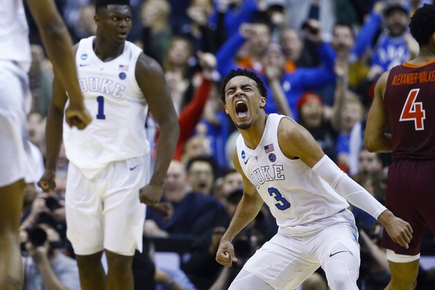 Duke guard Tre Jones (3) reacts after scoring against Virginia Tech during the second half of an NCAA men's college basketball tournament East Region semifinal in Washington, Friday, March 29, 2019. (AP Photo/Patrick Semansky)