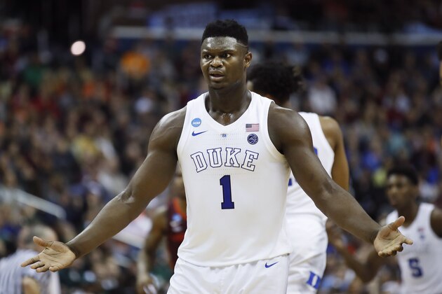 Duke forward Zion Williamson (1) reacts to a referee's call during the second half of the team's NCAA men's college basketball tournament East Region semifinal against Virginia Tech in Washington, Friday, March 29, 2019. (AP Photo/Alex Brandon)