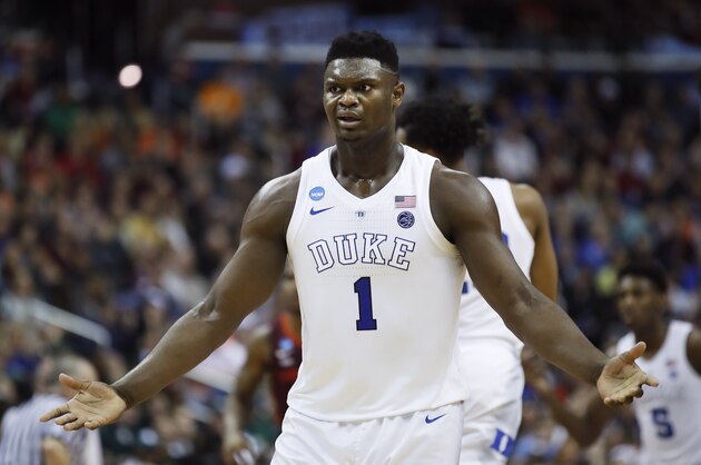 Duke forward Zion Williamson (1) reacts to a referee's call during the second half of the team's NCAA men's college basketball tournament East Region semifinal against Virginia Tech in Washington, Friday, March 29, 2019. (AP Photo/Alex Brandon)