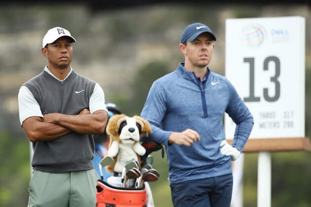 AUSTIN, TEXAS - MARCH 30: Tiger Woods of the United States and Rory McIlroy of Northern Ireland stand on the 13th tee during the fourth round of the World Golf Championships-Dell Technologies Match Play at Austin Country Club on March 30, 2019 in Austin, Texas. (Photo by Ezra Shaw/Getty Images)