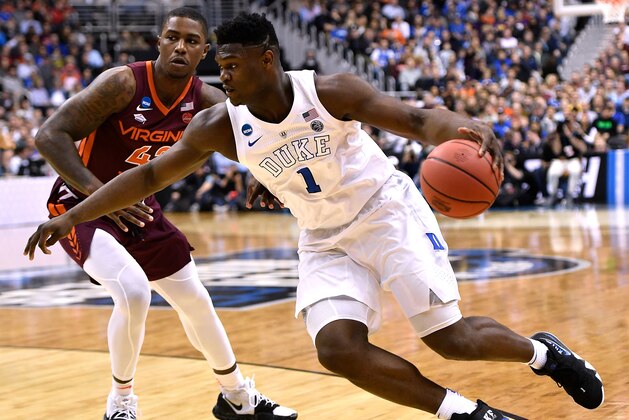 WASHINGTON, DC - MARCH 29: Zion Williamson #1 of the Duke Blue Devils drives against Ty Outlaw #42 of the Virginia Tech Hokies in the first half during the 2019 NCAA Men's Basketball Tournament East Regional Semifinals at Capital One Arena on March 29, 2019 in Washington, DC. (Photo by Lance King/Getty Images)