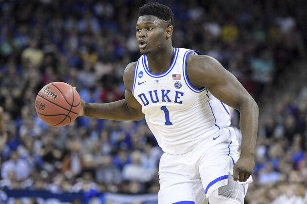 Duke forward Zion Williamson (1) dribbles the ball against Central Florida during the first half of a second-round game in the NCAA men's college basketball tournament Sunday, March 24, 2019, in Columbia, S.C. (AP Photo/Sean Rayford)