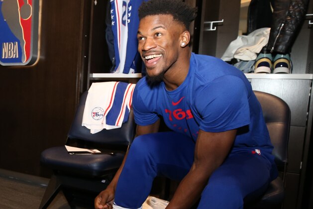 MINNEAPOLIS, MN -  MARCH 30: Jimmy Butler #23 of the Philadelphia 76ers laces up sneakers in the locker room before the game against the Minnesota Timberwolves on March 30, 2019 at Target Center in Minneapolis, Minnesota. NOTE TO USER: User expressly acknowledges and agrees that, by downloading and or using this Photograph, user is consenting to the terms and conditions of the Getty Images License Agreement. Mandatory Copyright Notice: Copyright 2019 NBAE (Photo by David Sherman/NBAE via Getty Images)