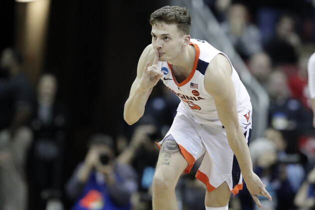 Virginia's Kyle Guy reacts during the second half of the men's NCAA Tournament college basketball South Regional final game against Purdue, Saturday, March 30, 2019, in Louisville, Ky. (AP Photo/Michael Conroy)