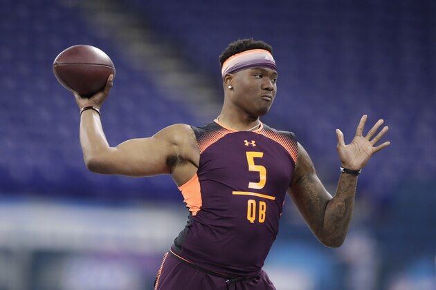 Ohio State quarterback Dwayne Haskins runs a drill at the NFL football scouting combine in Indianapolis, Saturday, March 2, 2019. (AP Photo/Michael Conroy)