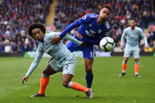 CARDIFF, WALES - MARCH 31:   Willian of Chelsea battles for possession with cc11 during the Premier League match between Cardiff City and Chelsea FC at Cardiff City Stadium on March 31, 2019 in Cardiff, United Kingdom. (Photo by Stu Forster/Getty Images)