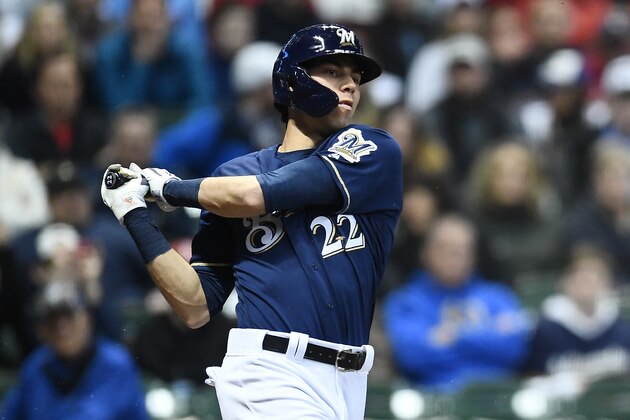 MILWAUKEE, WISCONSIN - MARCH 30:  Christian Yelich #22 of the Milwaukee Brewers swings at a pitch during the eighth inning of a game against the St. Louis Cardinals at Miller Park on March 30, 2019 in Milwaukee, Wisconsin. (Photo by Stacy Revere/Getty Images)