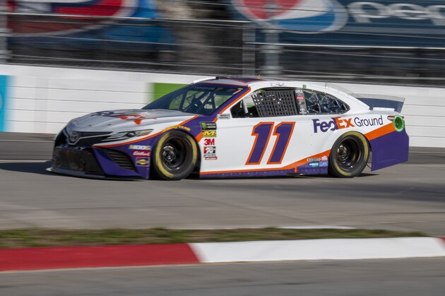 Denny Hamlin races for position during qualifying for the NASCAR Monster Energy Cup Series race at Martinsville Speedway in Martinsville, Va., Saturday, March 23, 2019. (AP Photo/Matt Bell)