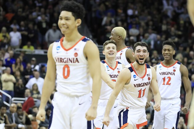 LOUISVILLE, KENTUCKY - MARCH 30:  Ty Jerome #11 of the Virginia Cavaliers reacts after they defeated the Purdue Boilermakers 80-75 to advance to the Final Four in overtime of the 2019 NCAA Men's Basketball Tournament South Regional at KFC YUM! Center on March 30, 2019 in Louisville, Kentucky. (Photo by Andy Lyons/Getty Images)