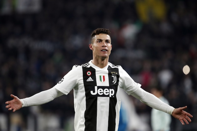 Juventus' Cristiano Ronaldo celebrates at the end of the Champions League round of 16, 2nd leg, soccer match between Juventus and Atletico Madrid at the Allianz stadium in Turin, Italy, Tuesday, March 12, 2019. Ronaldo scored the three goals in Juventus 3-0 win.(AP Photo/Antonio Calanni)