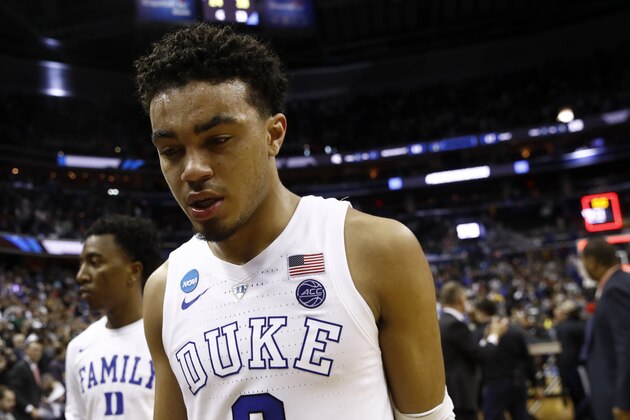 Duke guard Tre Jones walks off the court after an NCAA men's East Regional final college basketball game against Duke, Sunday, March 31, 2019, in Washington. Michigan State won 68-67. (AP Photo/Patrick Semansky)