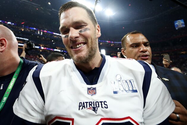ATLANTA, GEORGIA - FEBRUARY 03:  Tom Brady #12 of the New England Patriots  celebrate the teams 13-3 win over the Los Angeles Rams during Super Bowl LIII at Mercedes-Benz Stadium on February 03, 2019 in Atlanta, Georgia. (Photo by Al Bello/Getty Images)