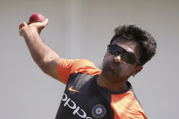 FILE - In this Jan. 2, 2019, file photo, India's Ravi Ashwin bowls during a training session in Sydney, ahead of their cricket test match against Australia starting Jan. 3.  There are contentious issues in cricket that seemingly just aren’t cricket. Take for instance one particular run out in the Indian Premier League. It was within the rules of the game but against some people’s concept of the spirit of cricket. And it has divided fans, former players and experts across the world. It’s called a Mankad. Debate has raged since Kings XI Punjab skipper Ravi Ashwin ran out Rajasthan Royals batter Jos Buttler at the non-striker’s end. (AP Photo/Rick Rycroft, File)