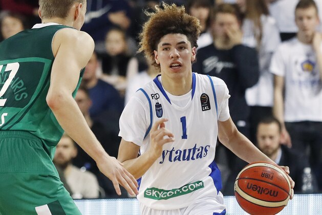 FILE - In this Jan. 9, 2018, file photo, BC Prienu Vytautas's LaMelo Ball is shown in action during the Big Baller Brand Challenge friendly tournament match against BC Zalgiris-2 in Prienai, Lithuania. LaMelo Ball, the brother of Los Angeles Lakers guard Lonzo Ball, has been ejected from a game in Lithuania after striking an opponent. Ball clashed with Lithuanian player Mindaugas Susinskas during Monday's, Oct. 1, 2018, exhibition game between local club Dzukija and a touring team of United States players from the Junior Basketball Association established by the Ball brothers' father, LaVar Ball. (AP Photo/Liusjenas Kulbis, File)