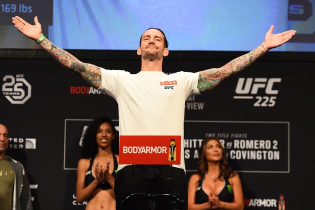 CHICAGO, ILLINOIS - JUNE 08:  CM Punk poses on the scale during the UFC 225 weigh-in at the United Center on June 8, 2018 in Chicago, Illinois. (Photo by Josh Hedges/Zuffa LLC/Zuffa LLC via Getty Images)
