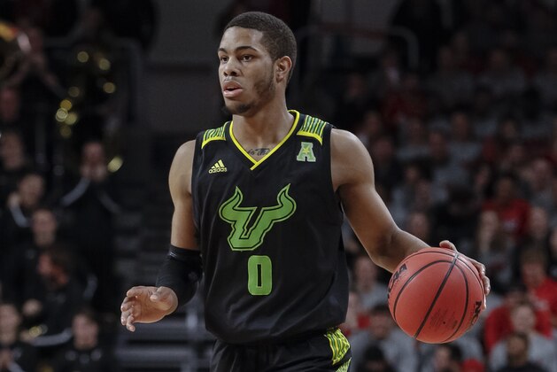 CINCINNATI, OH - JANUARY 15: David Collins #0 of the South Florida Bulls brings the ball up court during the game against the Cincinnati Bearcats at Fifth Third Arena on January 15, 2019 in Cincinnati, Ohio. (Photo by Michael Hickey/Getty Images)