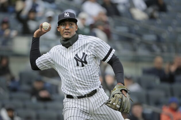 New York Yankees' Miguel Andujar throws to first base during the second inning of a baseball game against the Baltimore Orioles at Yankee Stadium Sunday, March 31, 2019, in New York. (AP Photo/Seth Wenig)