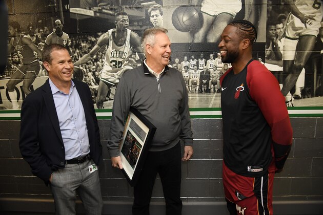 BOSTON, MA - APRIL 1: President of the Boston Celtics, Rich Gotham and General Manager of the Boston Celtics, Danny Ainge talk to Dwyane Wade #3 of the Miami Heat prior to a game on April 1, 2019 at the TD Garden in Boston, Massachusetts.  NOTE TO USER: User expressly acknowledges and agrees that, by downloading and or using this photograph, User is consenting to the terms and conditions of the Getty Images License Agreement. Mandatory Copyright Notice: Copyright 2019 NBAE  (Photo by Brian Babineau/NBAE via Getty Images)