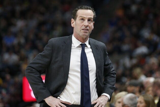 Brooklyn Nets head coach Kenny Atkinson looks at the scoreboard in the first half during an NBA basketball game against the Utah Jazz Saturday, March 16, 2019, in Salt Lake City. (AP Photo/Rick Bowmer)