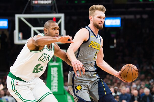 BOSTON, MA - MARCH 29: Domantos Sabonis #11 of the Indiana Pacers is defended by Al Horford #42 of the Boston Celtics  at TD Garden on March 29, 2019 in Boston, Massachusetts. NOTE TO USER: User expressly acknowledges and agrees that, by downloading and or using this photograph, User is consenting to the terms and conditions of the Getty Images License Agreement. (Photo by Kathryn Riley/Getty Images)