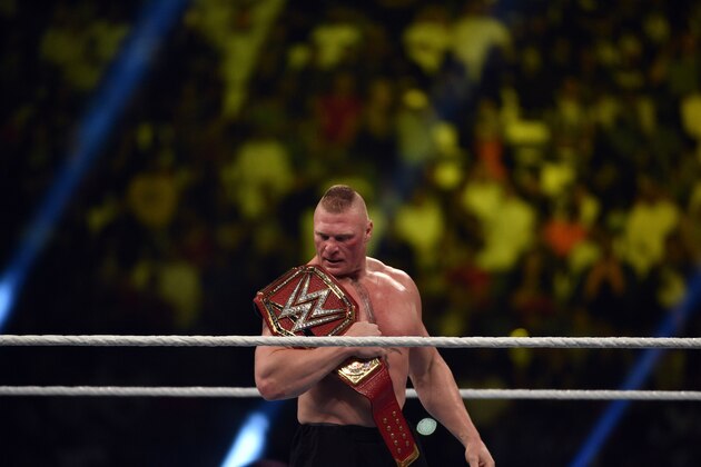 Brock Lesnar celebrates after winning the WWE Universal Championship match as part of as part of the World Wrestling Entertainment (WWE) Crown Jewel pay-per-view at the King Saud University Stadium in Riyadh on November 2, 2018. (Photo by Fayez Nureldine / AFP)        (Photo credit should read FAYEZ NURELDINE/AFP/Getty Images)