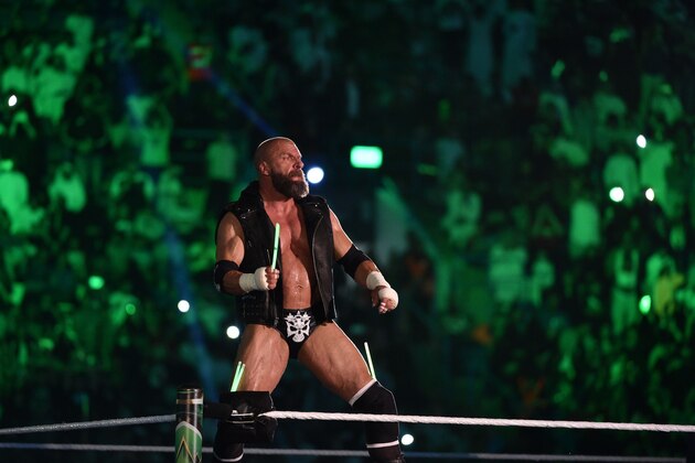 Triple H, of D-Generation X, greets the fans during a tag team match as part of as part of the World Wrestling Entertainment (WWE) Crown Jewel pay-per-view at the King Saud University Stadium in Riyadh on November 2, 2018. (Photo by Fayez Nureldine / AFP)        (Photo credit should read FAYEZ NURELDINE/AFP/Getty Images)