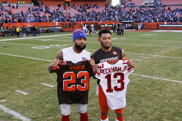 New York Giants wide receiver Odell Beckham, left, and Cleveland Browns cornerback Joe Haden, right, exchange jerseys after an NFL football game, Sunday, Nov. 27, 2016, in Cleveland. (AP Photo/Ron Schwane)