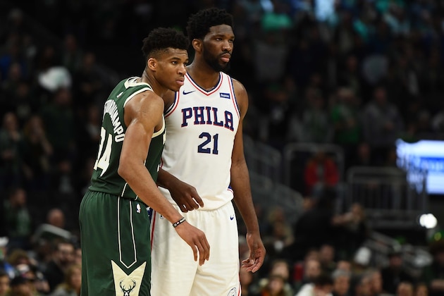 MILWAUKEE, WISCONSIN - MARCH 17:  Giannis Antetokounmpo #34 of the Milwaukee Bucks works against Joel Embiid #21 of the Philadelphia 76ers during a game at Fiserv Forum on March 17, 2019 in Milwaukee, Wisconsin. NOTE TO USER: User expressly acknowledges and agrees that, by downloading and or using this photograph, User is consenting to the terms and conditions of the Getty Images License Agreement. (Photo by Stacy Revere/Getty Images)