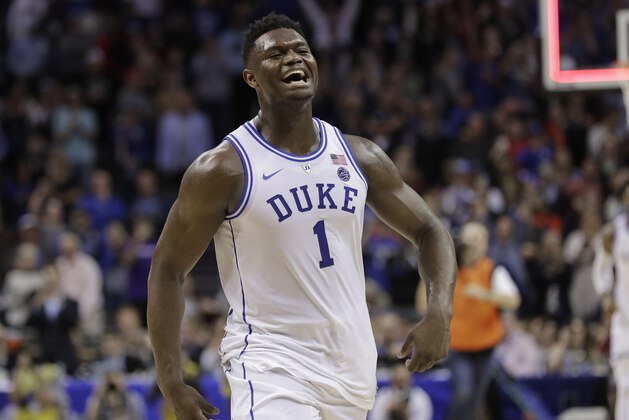Duke's Zion Williamson (1) celebrates after Duke defeated Florida State in the NCAA college basketball championship game of the Atlantic Coast Conference tournament in Charlotte, N.C., Saturday, March 16, 2019. (AP Photo/Nell Redmond)