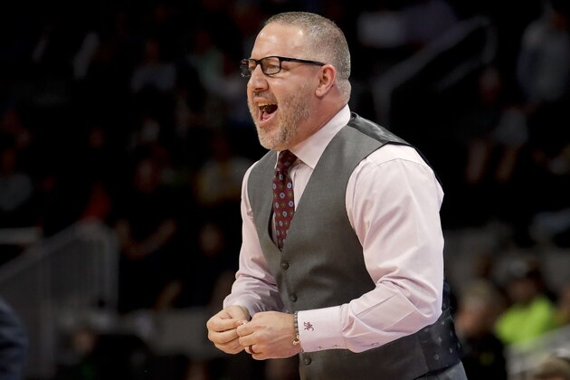 Virginia Tech coach Buzz Williams yells during the first half of the team's second-round game against Liberty in the NCAA men's college basketball tournament Sunday, March 24, 2019, in San Jose, Calif. (AP Photo/Jeff Chiu)