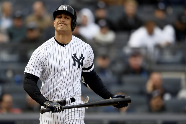 NEW YORK, NEW YORK - MARCH 28: Giancarlo Stanton #27 of the New York Yankees reacts after striking out during the eighth inning of the game against the Baltimore Orioles during Opening Day at Yankee Stadium on March 28, 2019 in the Bronx borough of New York City. (Photo by Sarah Stier/Getty Images)